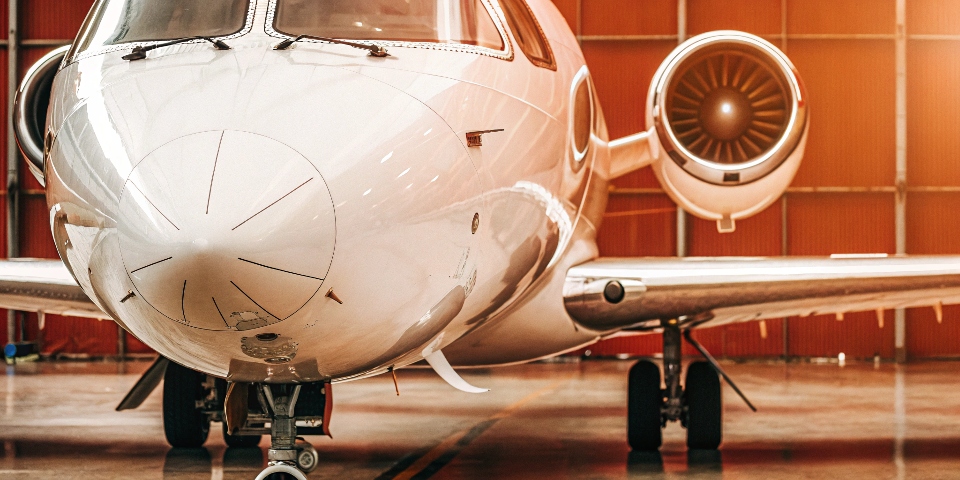 An image of a modern jet aircraft with callouts pointing to titanium components like the engine and [landing gear](https://titonestmetal.com/understanding-titanium-metal-alloy-grades-uses-and-benefits/)[^2].