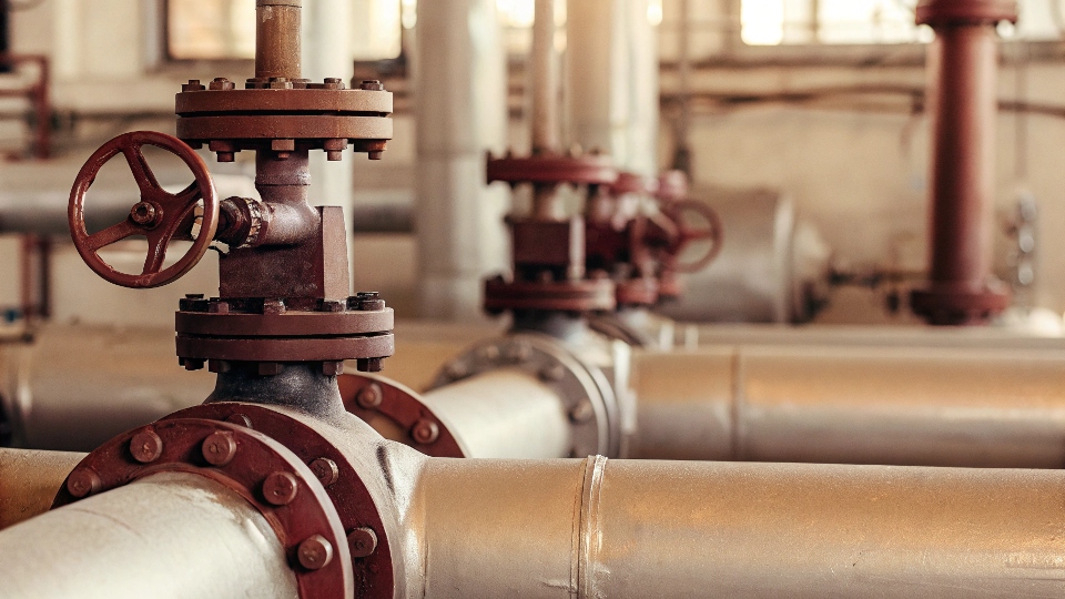 Titanium pipes and valves inside a chemical processing plant