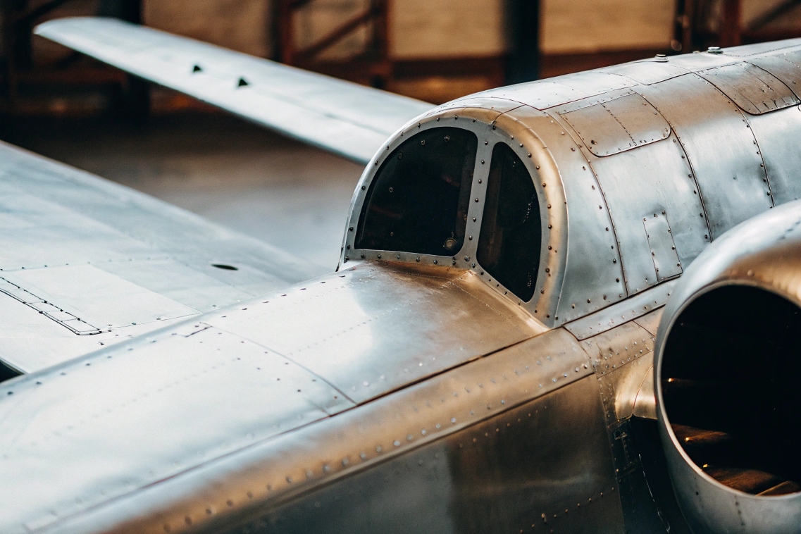 An airplane wing showing both aluminum skin and titanium components